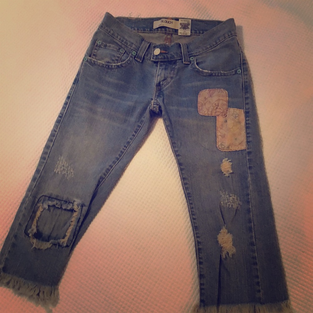 Distressed Levi’s 504 Slouch Jeans
